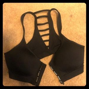 Pink zip front sports bra
